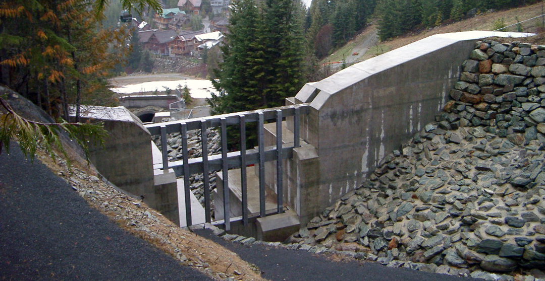 New state-of-the-art debris flow barrier designed to protect Whistler Village, aided by UBC Geological Engineering research.